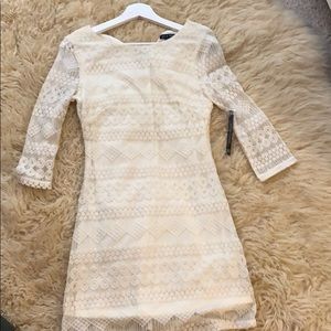 Cream colored lace dress with cream underlay..so S